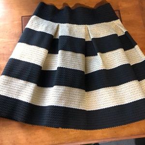 Pleated black cream and gold skirt